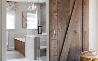 a bathroom with a sliding glass door