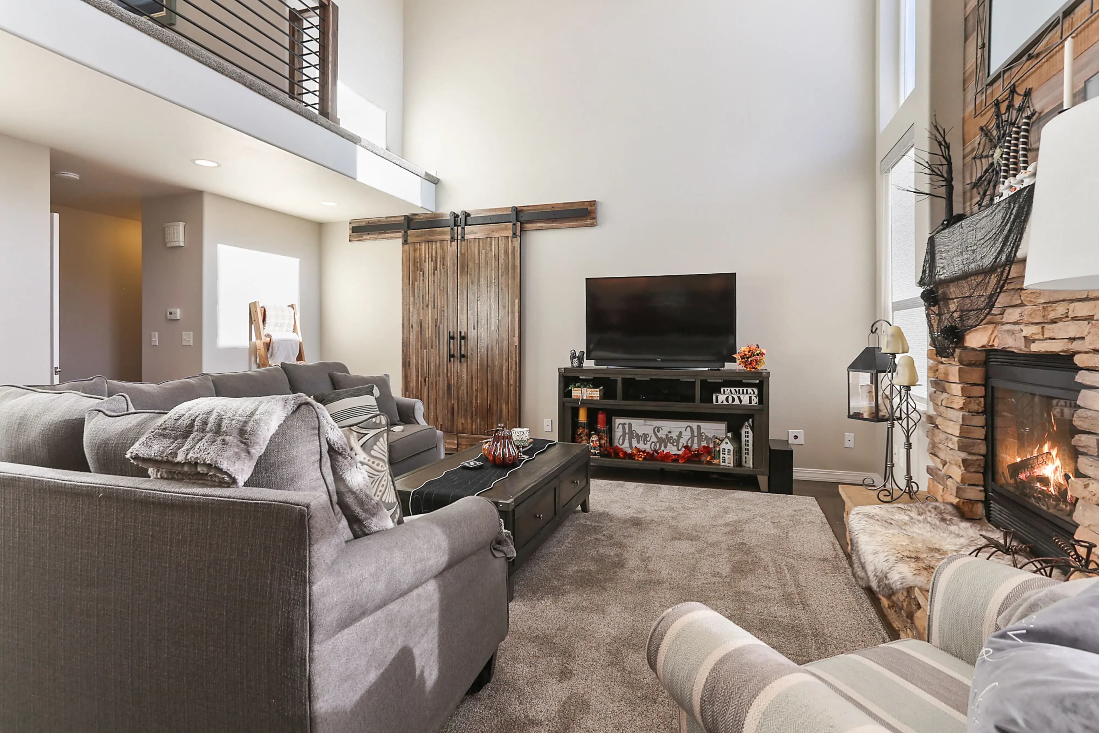 a sofa and a fireplace in the living room