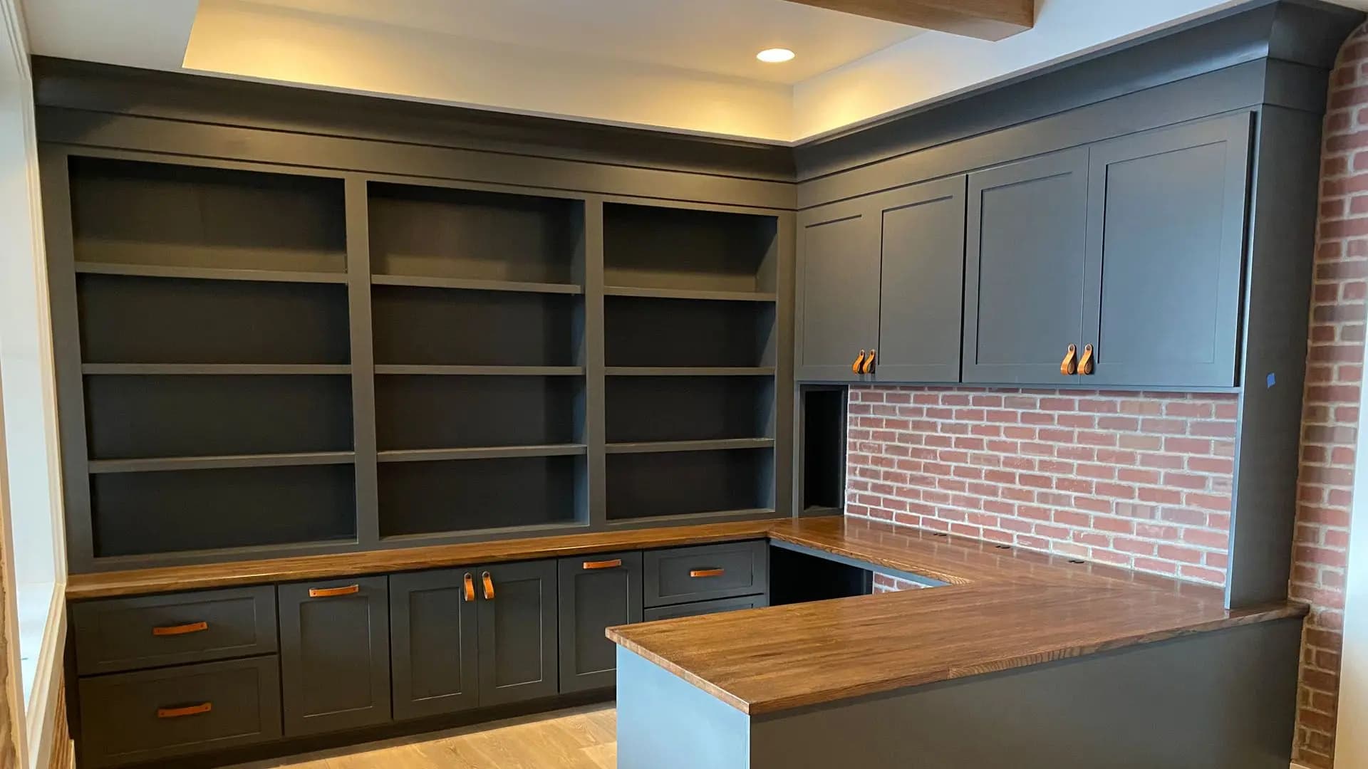 a room with shelves and cabinets