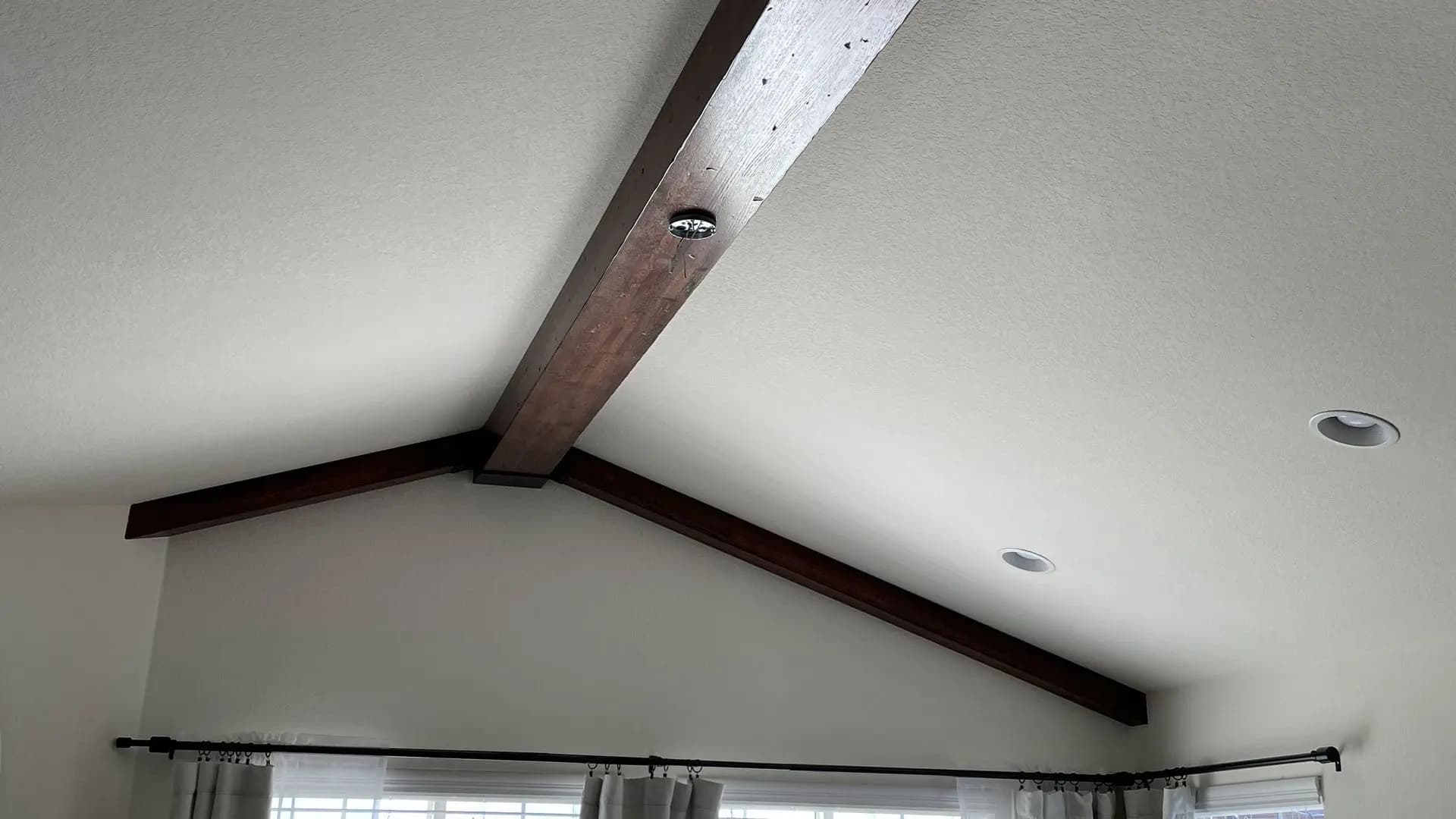 a wooden beam on a ceiling