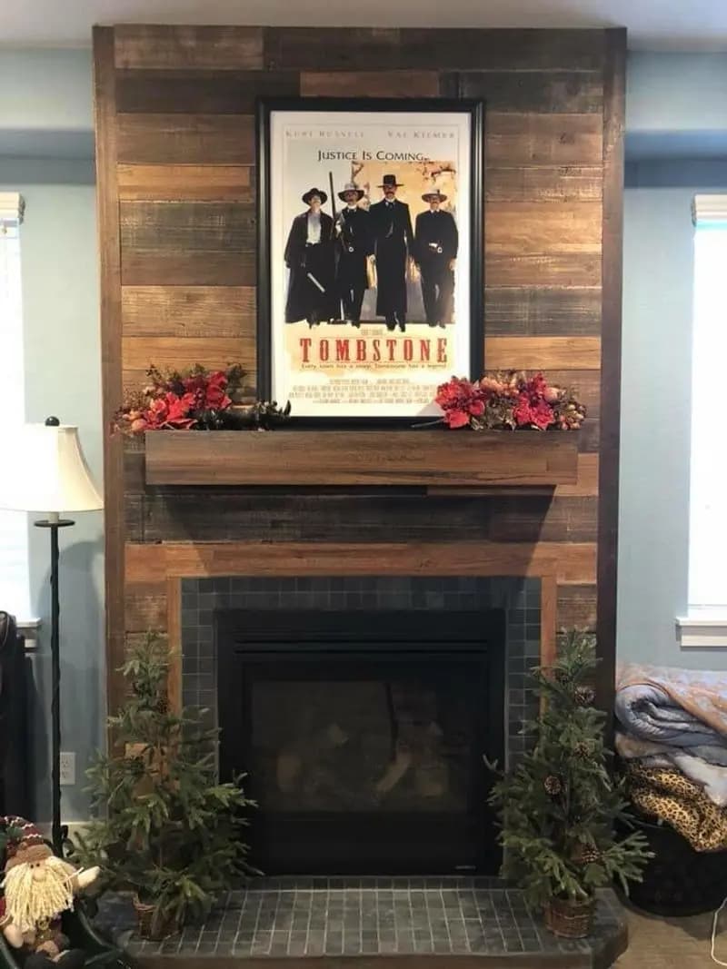 a poster above a fireplace